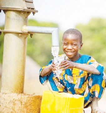 202311Girl-fetching-water-from-borehole