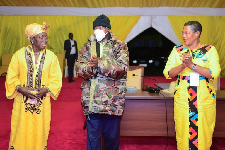202508NRM-chairman-Yoweri-Museveni-standing-between-Kadaga-and-Among-