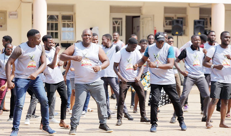 202509Mengo-SS-headteacher-Nantagya-Grace-Ssebanakitta-2nd-L-leads-teachers-and-former-students-in-physical-drills