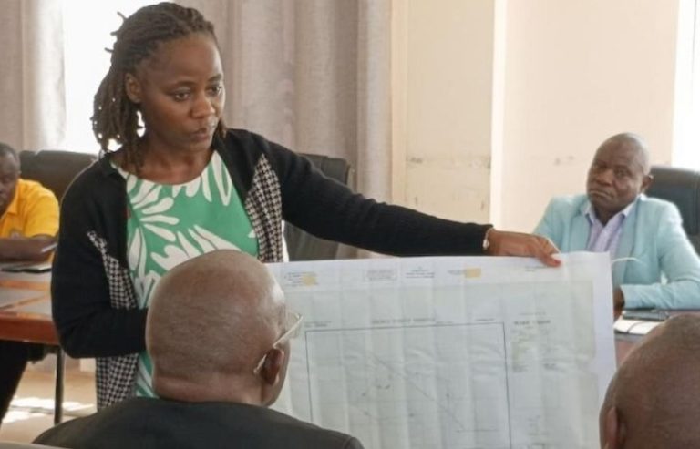 202509Soroti-district-officials-display-land-title-to-UBC-and-NFA-officials
