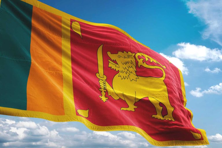Sri Lanka flag waving cloudy sky background