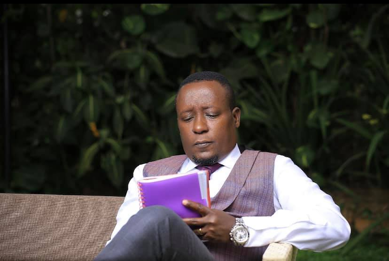 202107Joseph-Kabuleta-goes-through-his-notes