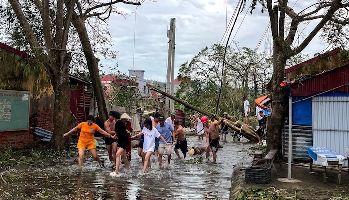 FILE PHOTO: Vietnam's export hub factories may face weeks of disruption after Typhoon Yagii