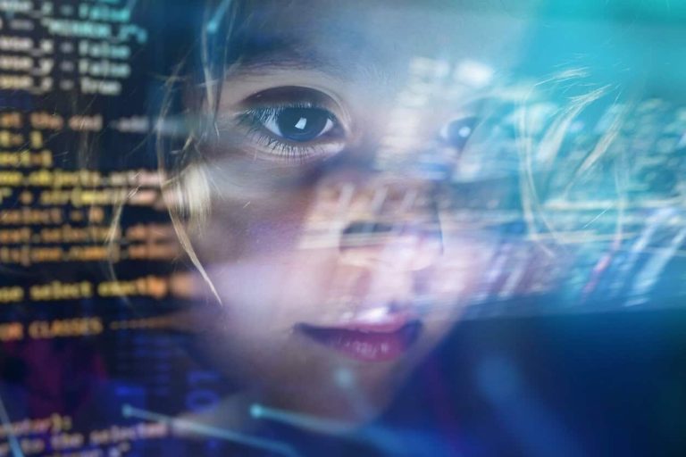 Close up of a little girl looking at some futuristic holograms.