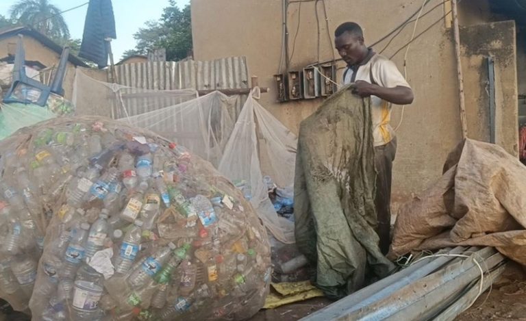 202510Ghetto-youth-collecting-plastics-in-Mukono