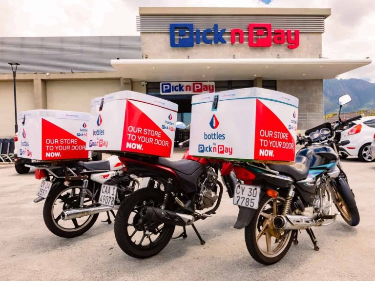 Express Service home delivery bikes parked outside local Pick n Pay grocery store