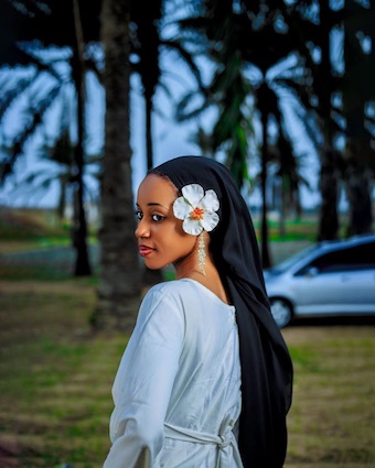 202510Woman-next-to-car