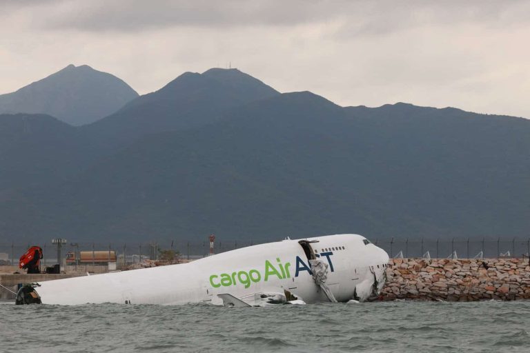 Cargo airplane skids off the runway at Hong Kong International Airport