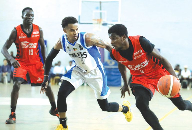 202511City-Oilers-Chad-Bowie-L-tries-to-stop-Blazers-Tonny-Drileba