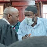 202511Jamil-Mukulu-with-his-lawyer