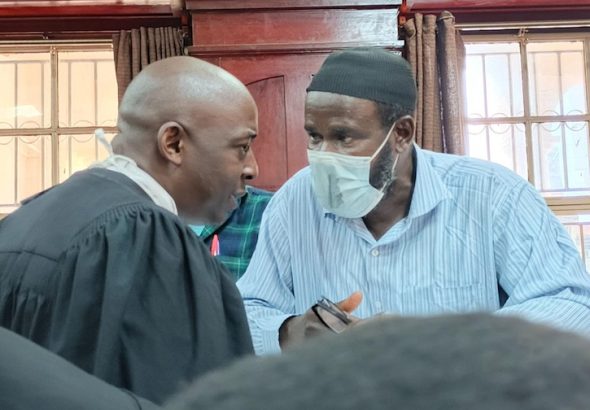 202511Jamil-Mukulu-with-his-lawyer