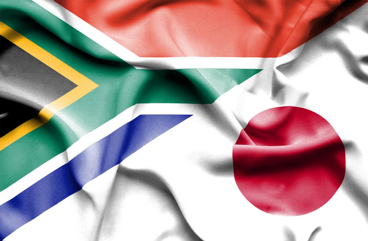 Waving flag of Japan and South Africa