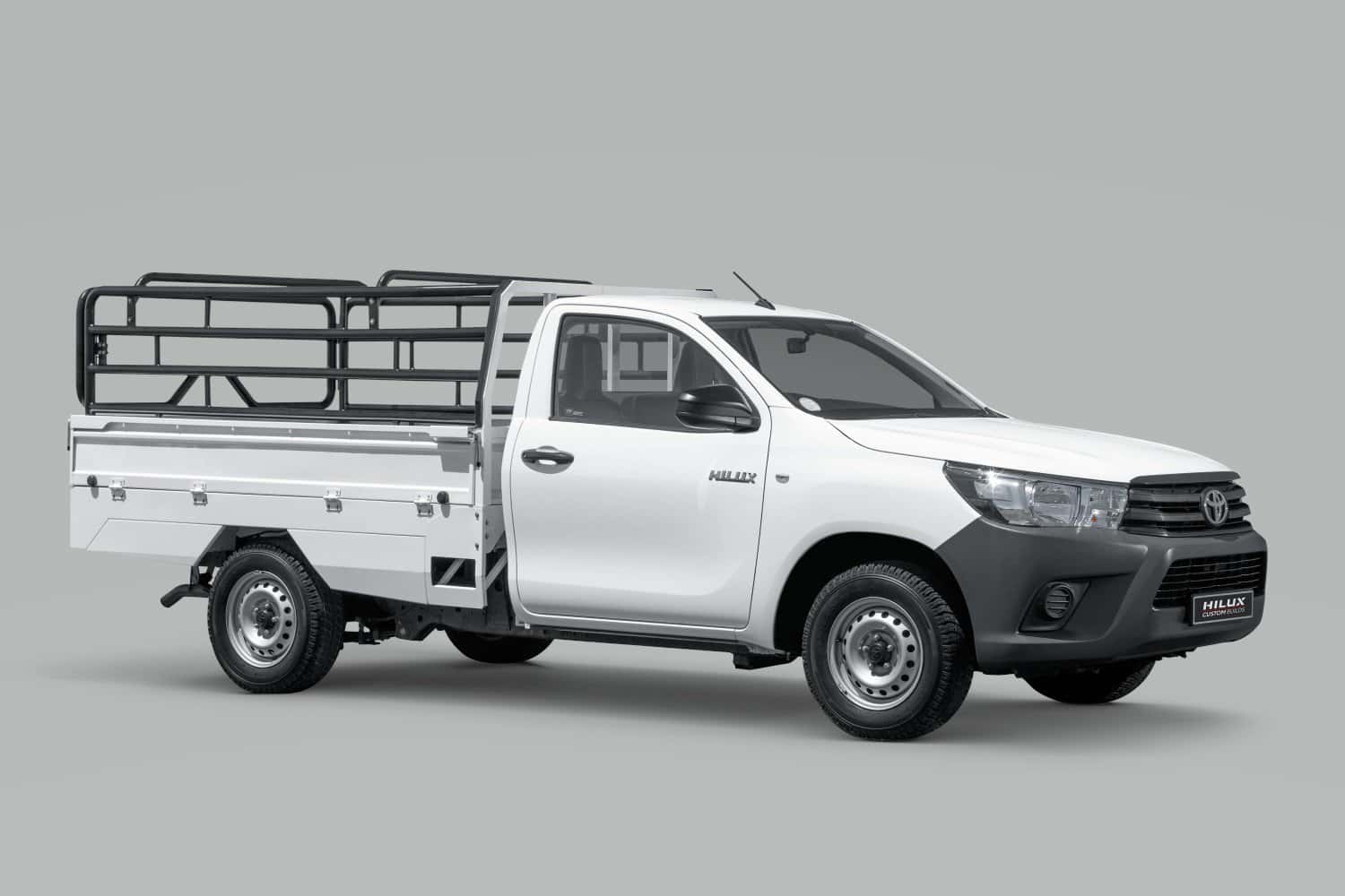 202511Toyota-Hilux-Dropside-with-Cargo-Rails