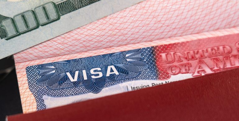 Russian,Passport,With,A,Us,Visa,And,A,Hundred,Dollars