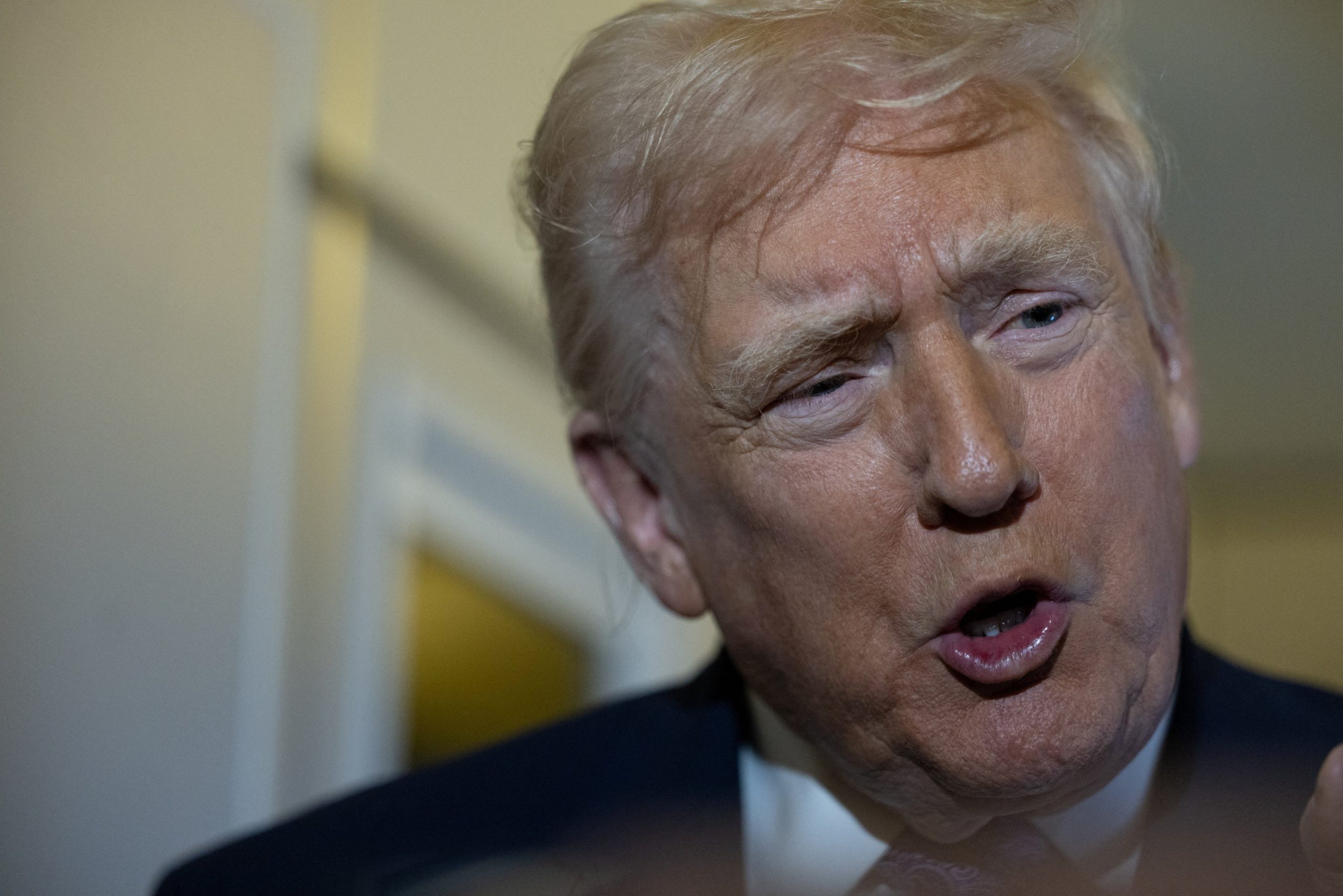 2025122025-11-30T222850Z_389412069_RC2A7IAUUQXG_RTRMADP_3_USA-TRUMP-scaled-1