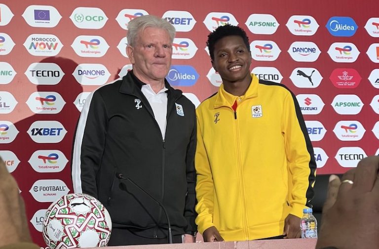 202512Allan-Okello-with-Cranes-coach-Put