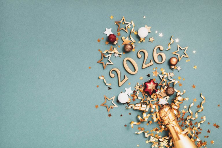 New Year festive background with golden champagne bottle, party streamers, Christmas balls, confetti stars and 2026 numbers top view.