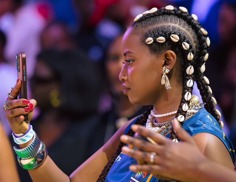 202512Claudia-Naisabwa-on-phone