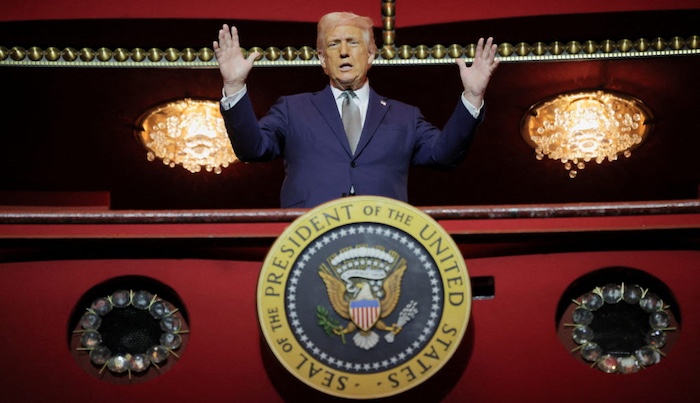 U.S. President Donald Trump stands at the presidential box at the Kennedy Center in Washington