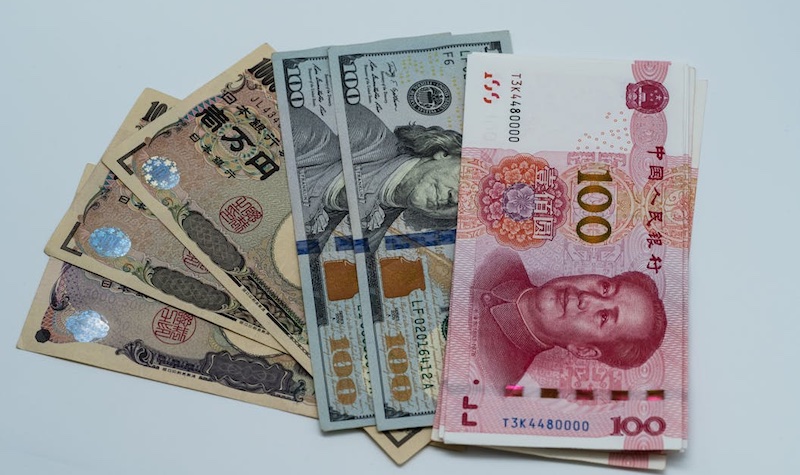 202512Yuan-and-dollars