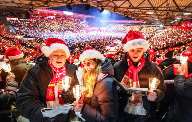 Fans sing traditional christmas carols at 1. FC Union Berlin football club stadium