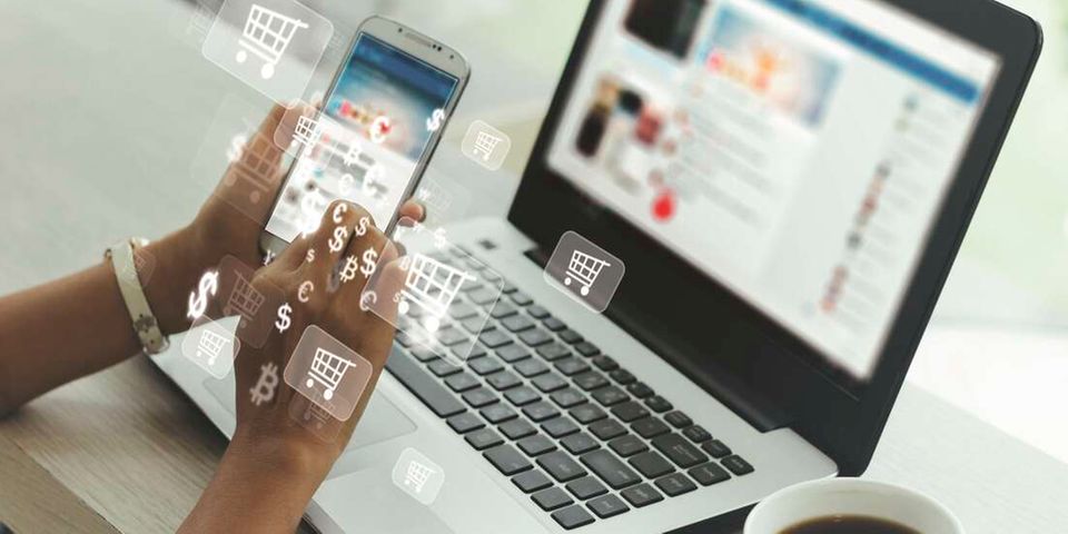 Businesswoman,Phone,And,Laptop,Using,,,Online,Shopping,Concept.