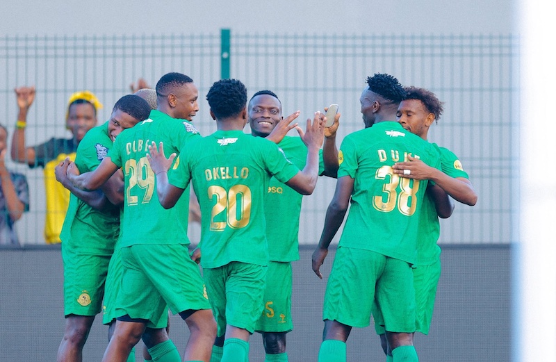 202601Allan-Okello-with-fellow-Yanga-players