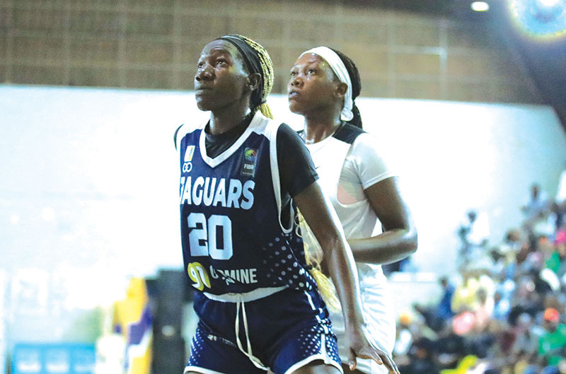 202601Mercy-Batamuliza-of-JT-Jaquars-marked-by-Shadia-Nassanga-of-JKL-Dolphins