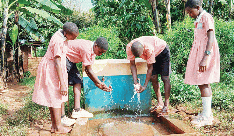 202512Students-fetch-water-at-water-supply-point-in-Kumi