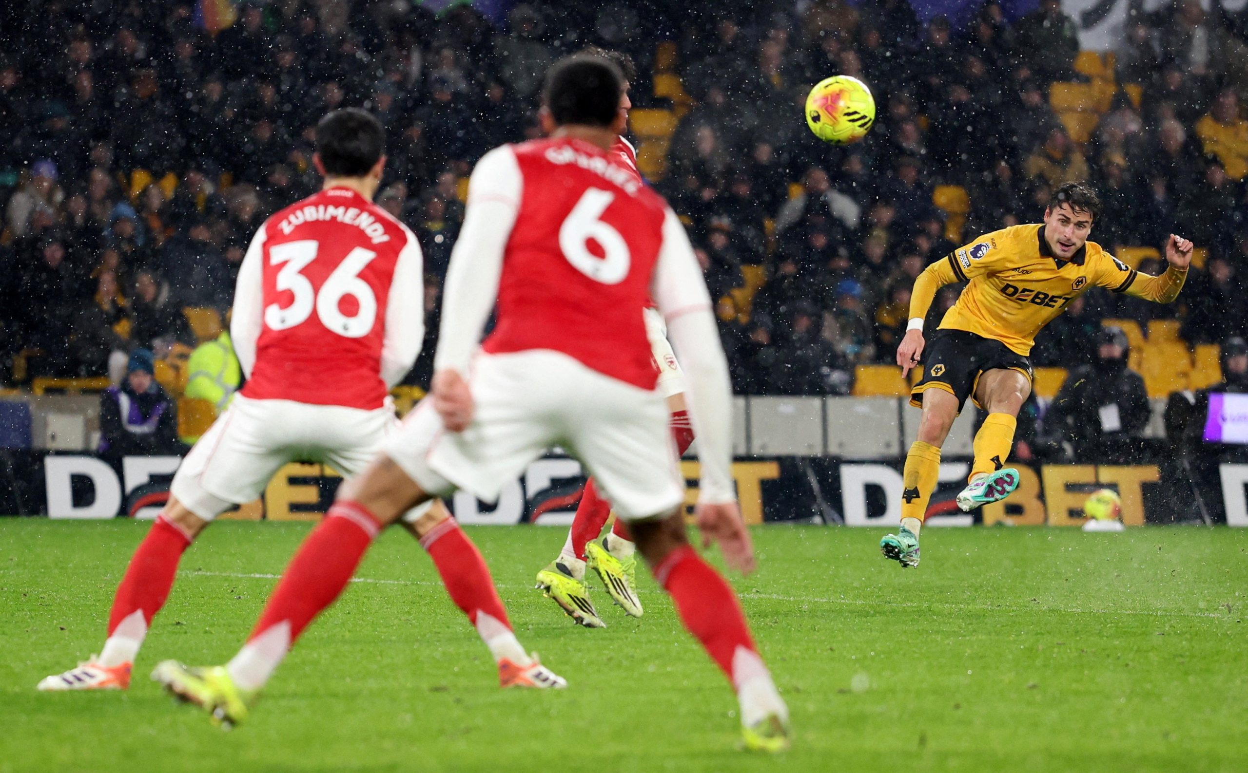 2026022026-02-18T221533Z_666554081_UP1EM2I1NH61F_RTRMADP_3_SOCCER-ENGLAND-WOL-ARS-scaled-1