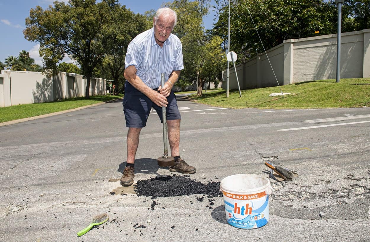Rainer Dixel (82) Fixes Potholes In His Street In Bryanston