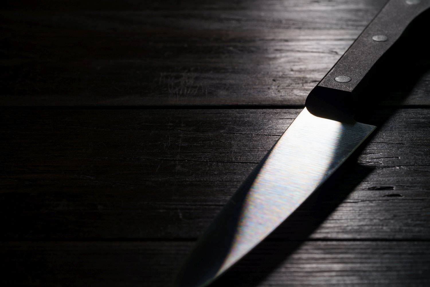Kitchen knife on dark background