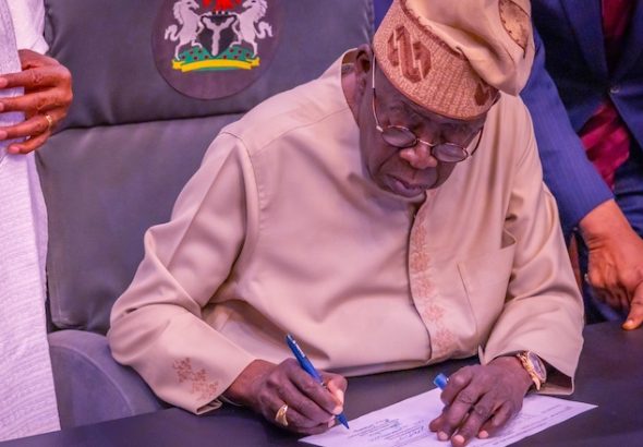 202602Tinubu-Signs-2022-Electoral-Act-Amendment-Bill-Into-Law4