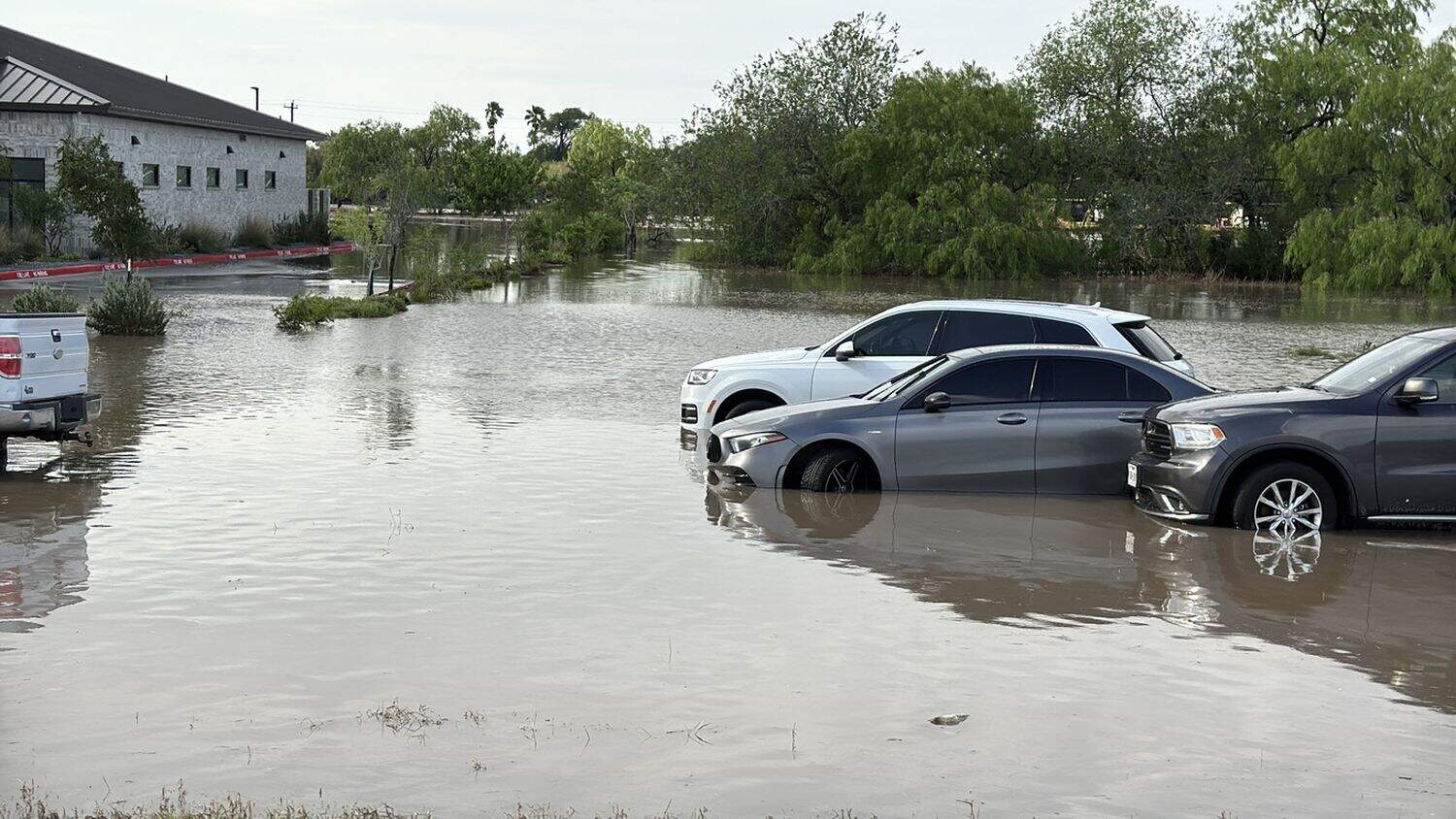 Flooded vehicles abandoned on South Texas interstate during heavy rainstorms