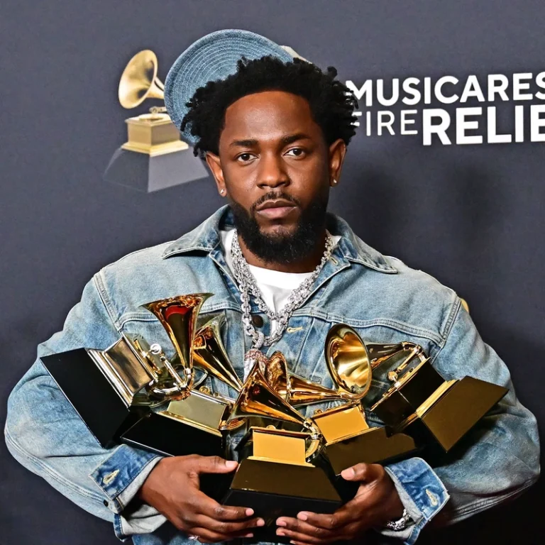 us-rapper-kendrick-lamar-poses-with-the-record-of-the-year-best-rap-performance-song-of-the-year-best-music-video-best-rap-s