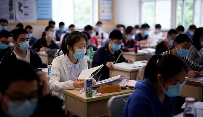202603China-Bans-Excess-Homework-And-Exams-In-New-Policy-To-Ease-Student-Pressure