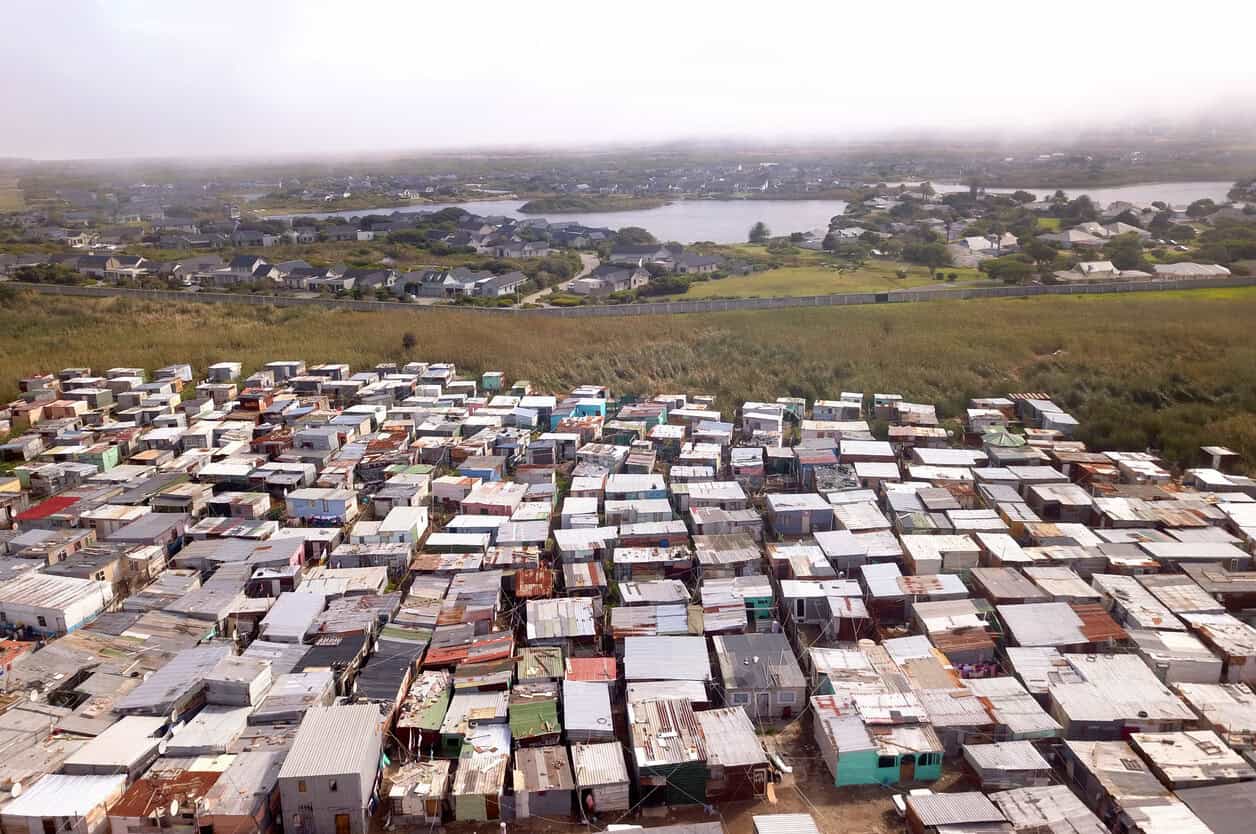 Aerial view of township and wealthy houses, in divided South Africa