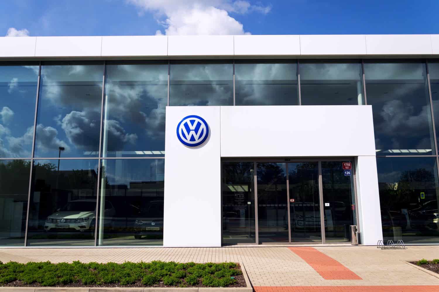 Volkswagen company logo on dealership building