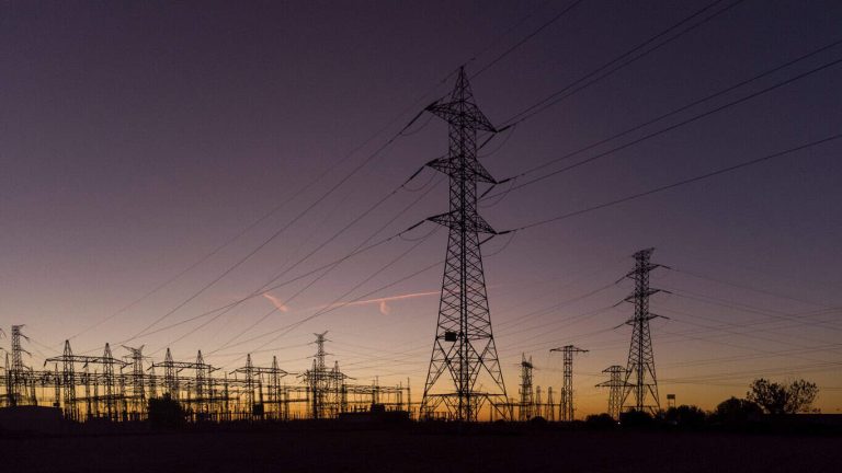 Electric substation at sunset