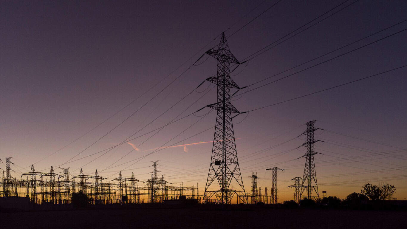 Electric substation at sunset