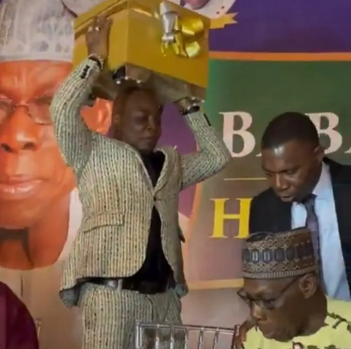 Charly-Boy-with-the-present-Instagram_-@areafada1-e1772807037370