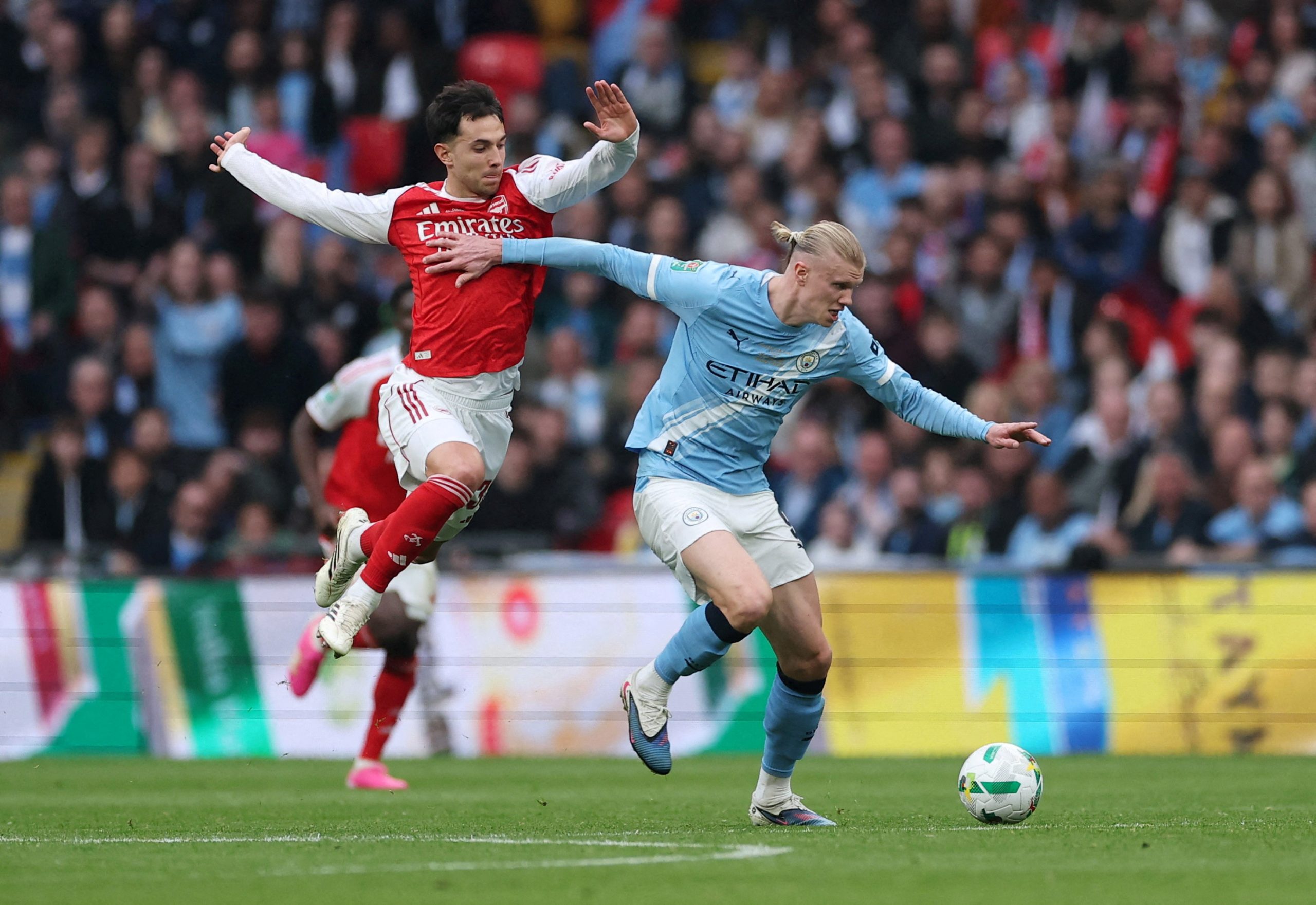 2026042026-03-22T180412Z_432381890_UP1EM3M1BYRPE_RTRMADP_3_SOCCER-ENGLAND-ARS-MCI-scaled-1