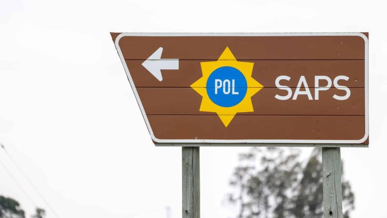 Directional sign to a South African Police Service (SAPS) station, office, in a rural area, Ventersdorp, North West Province. Crime, corruption and bribery