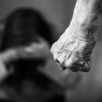 Domestic violence mans clenched fist