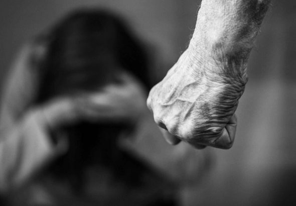 Domestic violence mans clenched fist
