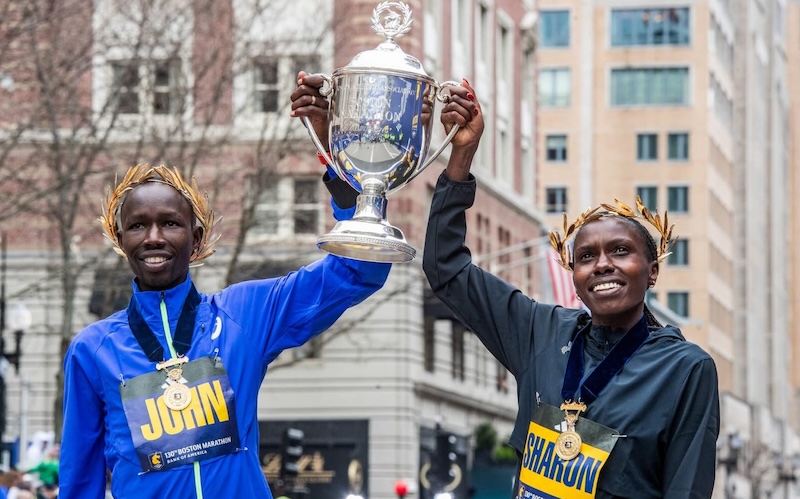202604John-and-Sharon-with-the-Boston-Marathon-trophy