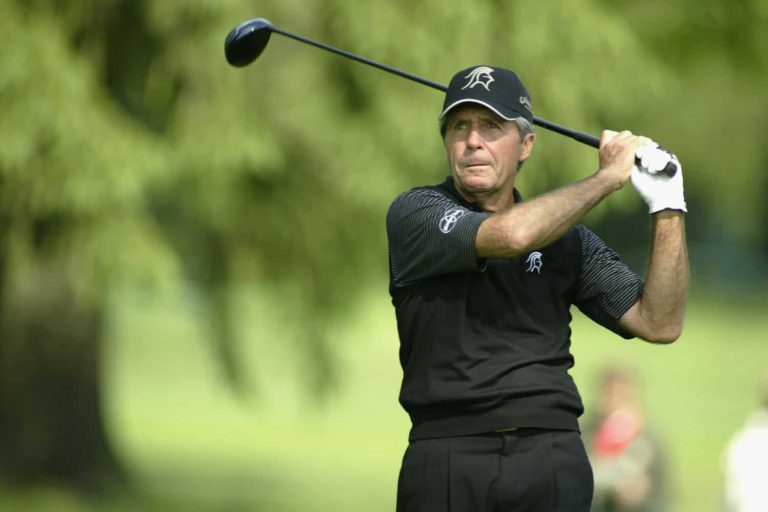 Gary Player hits a shot