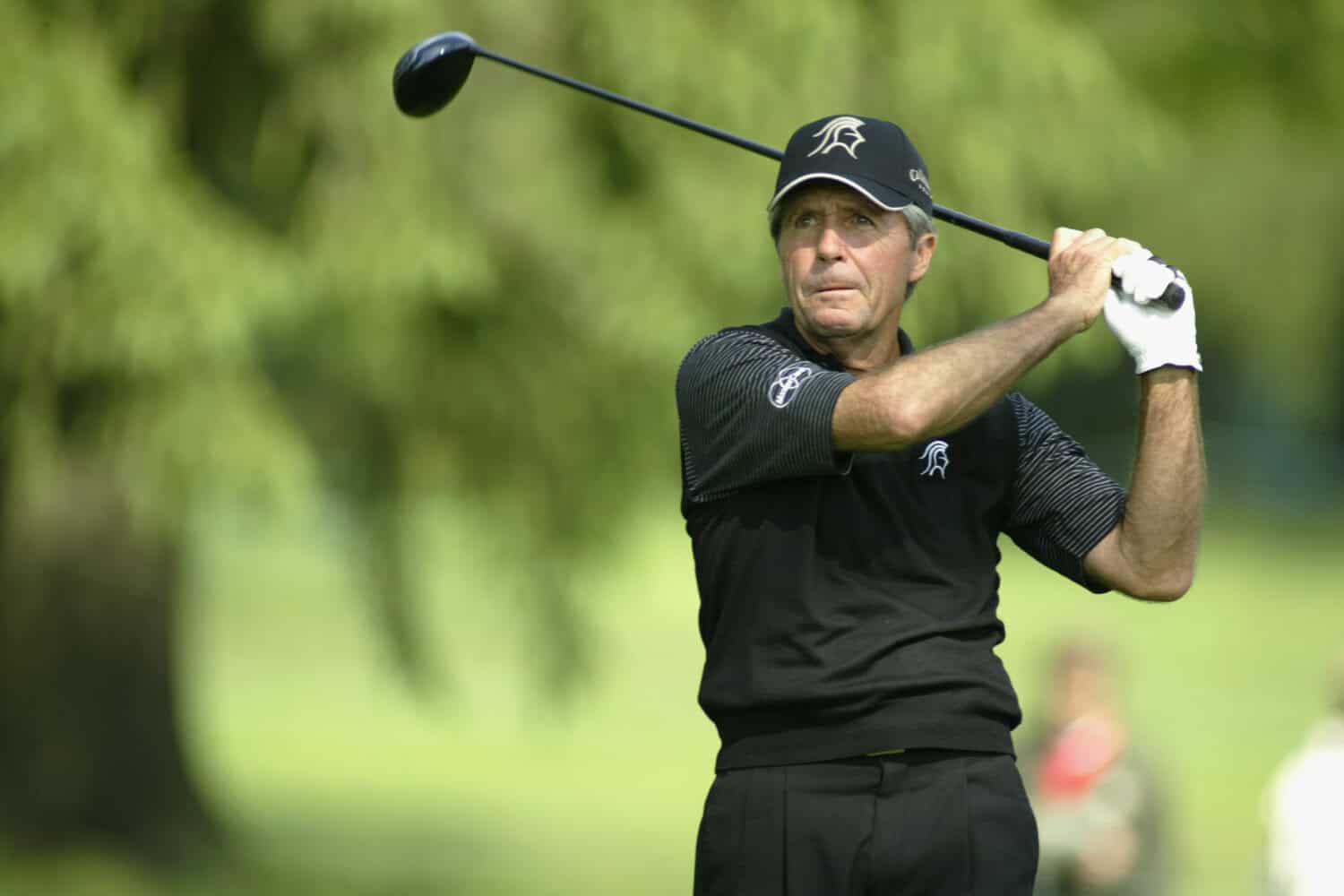 Gary Player hits a shot