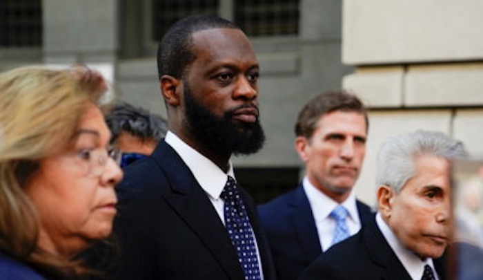 Rapper Prakazrel "Pras" Michel leaves U.S. federal court after being found guilty in Washington