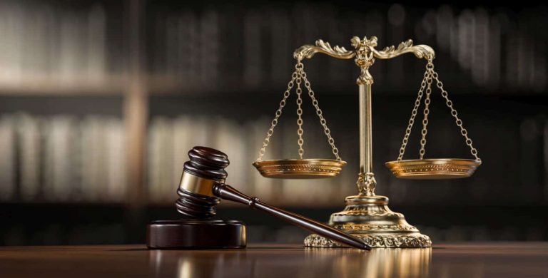 Legal concept: Scales of justice and and the judge's gavel hammer as a symbol of law and order